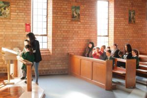 St Francis Xavier Catholic Primary School Ashbury - parents and children at mass